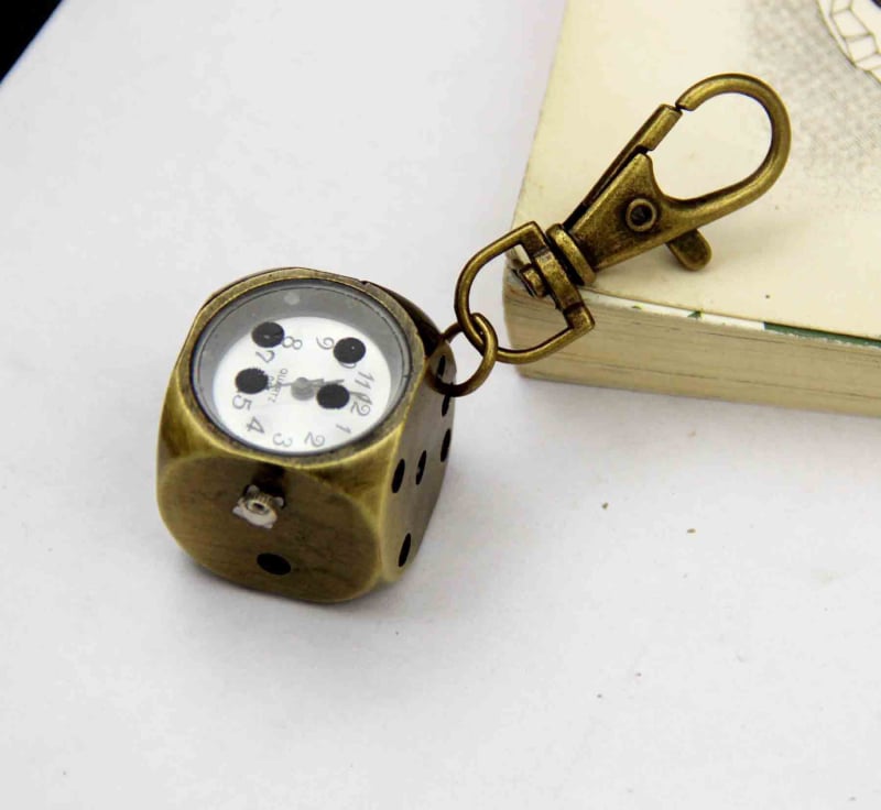Võtmehoidja koos mini taskukellaga, karikatuurstiilis, kvartsliikumine, metallkorpus, analoogne ekraan, klaas