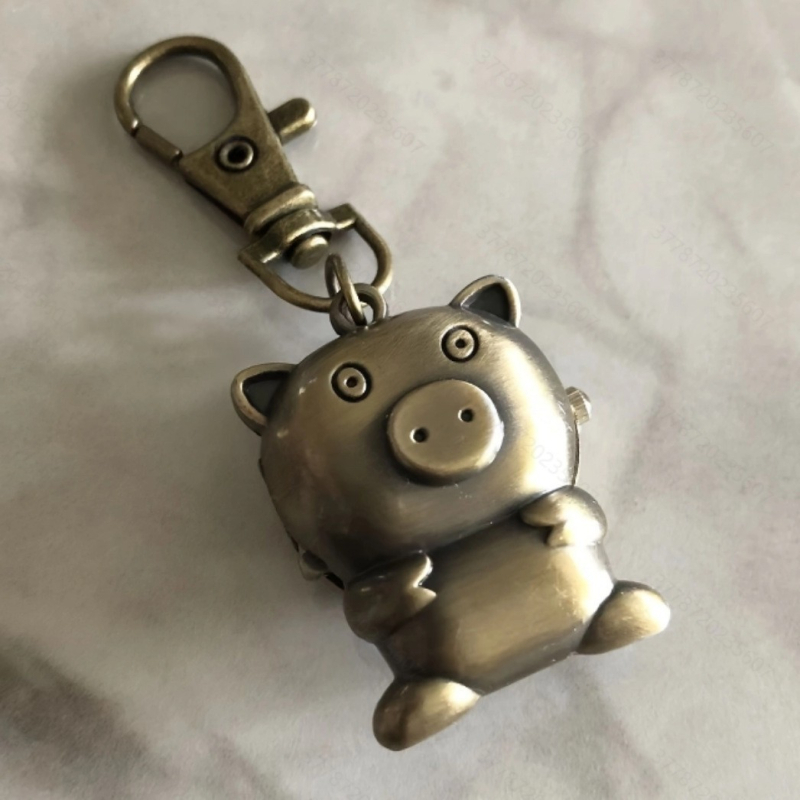 Võtmehoidja koos mini taskukellaga, karikatuurstiilis, kvartsliikumine, metallkorpus, analoogne ekraan, klaas