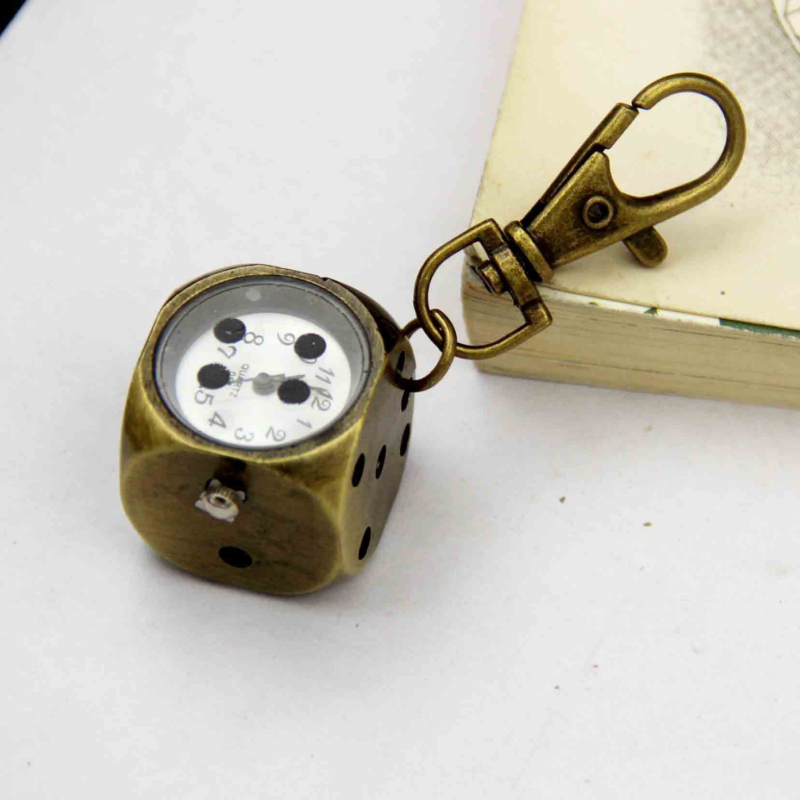 Võtmehoidja koos mini taskukellaga, karikatuurstiilis, kvartsliikumine, metallkorpus, analoogne ekraan, klaas