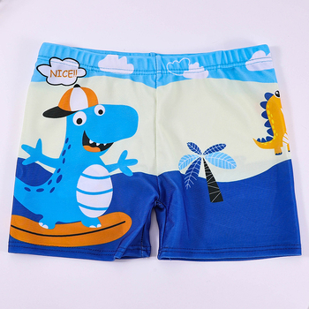 Vaikų plaukimo šortai su karikatūrų spauda, kvėpuojantys, greitai džiūstantys; audinys poliesteris 88%, vidinis pamušalas 12%