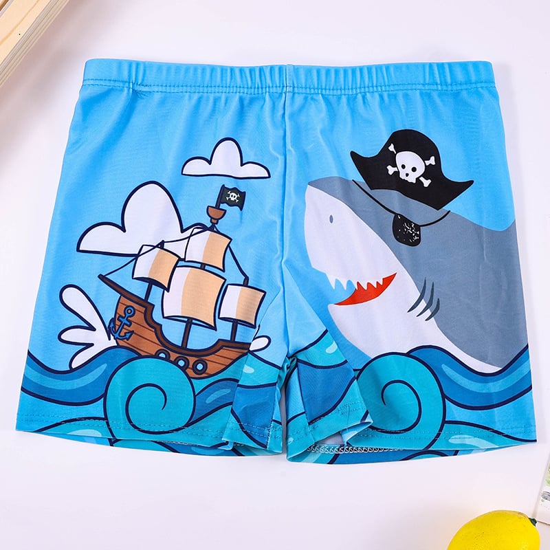 Vaikų plaukimo šortai su karikatūrų spauda, kvėpuojantys, greitai džiūstantys; audinys poliesteris 88%, vidinis pamušalas 12%