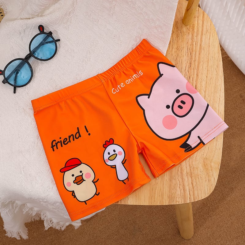 Vaikų plaukimo šortai su karikatūrų spauda, kvėpuojantys, greitai džiūstantys; audinys poliesteris 88%, vidinis pamušalas 12%