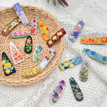 Etno stila krustdūruma komplekts matu spraudnim ūdens piliena formā ar ziedu motīvu