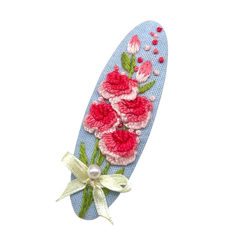 Etno stila krustdūruma komplekts matu spraudnim ūdens piliena formā ar ziedu motīvu