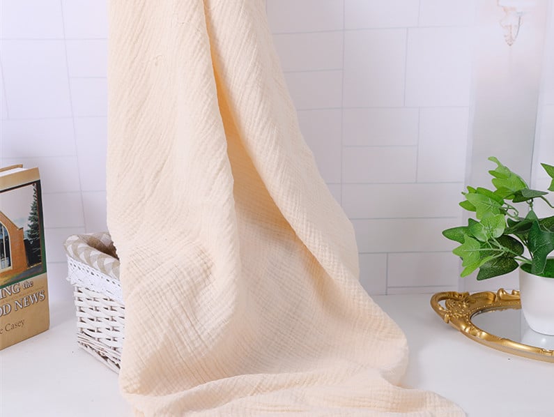 Vaikiška pledė iš 100% medvilnės, dviejų sluoksnių su kutais ir vientisu raštu, tinkama visoms sezonoms