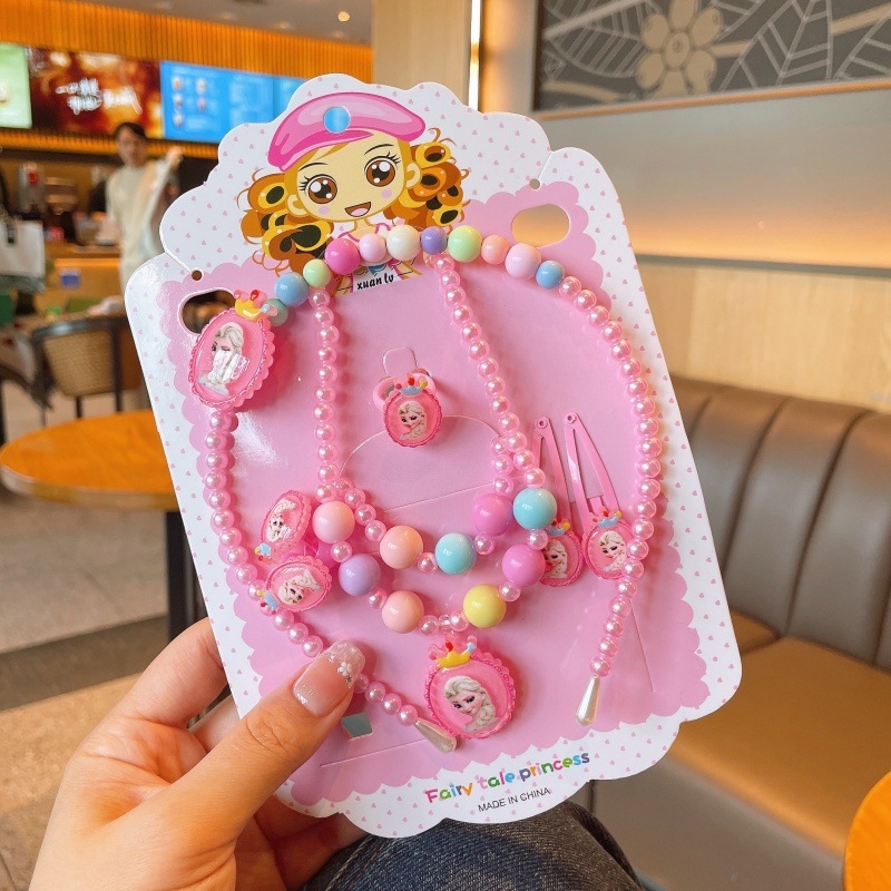 Vaikų animacinių filmų papuošalų rinkinys: vėrinys, apyrankė, žiedas ir plaukų segtukas; gyvūnų/zodiako formos; plastikinis pakabukas; kamuoliukų grandinė; apimtis 21–50 cm