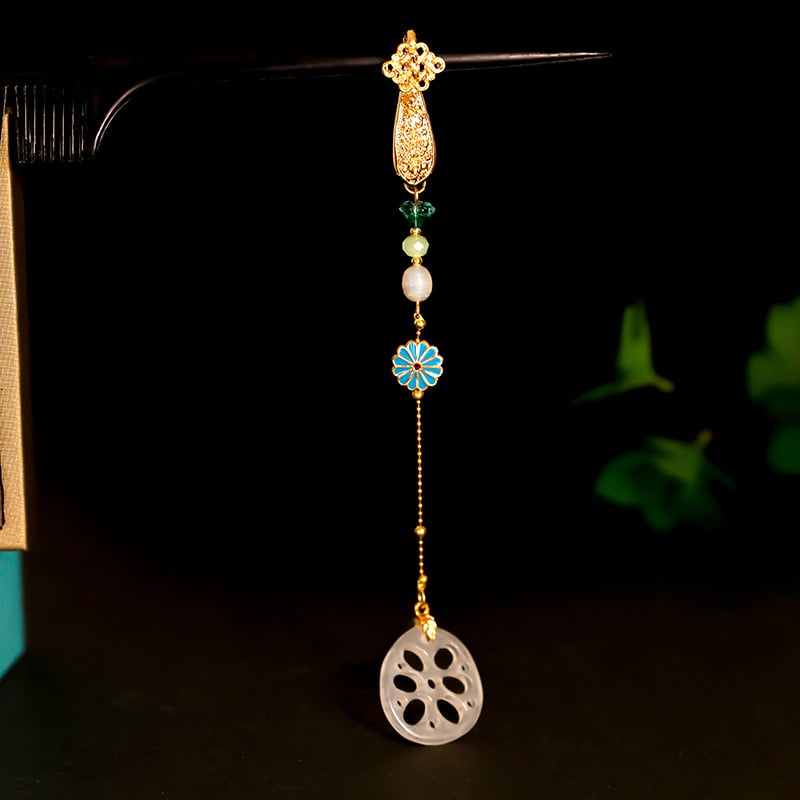 Lydinio segė kinų stiliaus su daugybe formų (širdis, gėlė, mazgas, rombas, geometrijos formos); dekoratyvus dėvėjimas, dviguba funkcija kaip pakabukas.