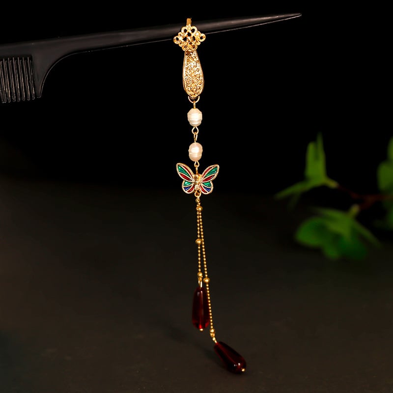 Lydinio segė kinų stiliaus su daugybe formų (širdis, gėlė, mazgas, rombas, geometrijos formos); dekoratyvus dėvėjimas, dviguba funkcija kaip pakabukas.