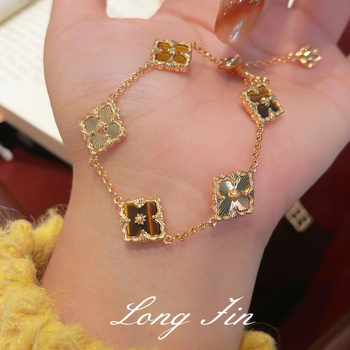 Prancūziškas retro ametisto juvelyrų komplektas — keturių lapų dobilas ir lango gėlių motyvas; varis, elektroplakavimas; perlų šluotos grandinė; įtraukiama karolį, apyrankę, auskarus ir žiedą