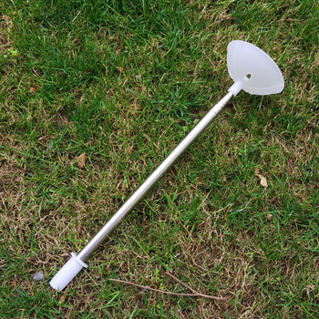 Baliono arkos pagrindas su vandeniu užpildyta baze – aliuminio folijos medžiaga; žaislinis balionas; nežemiško pobūdžio forma