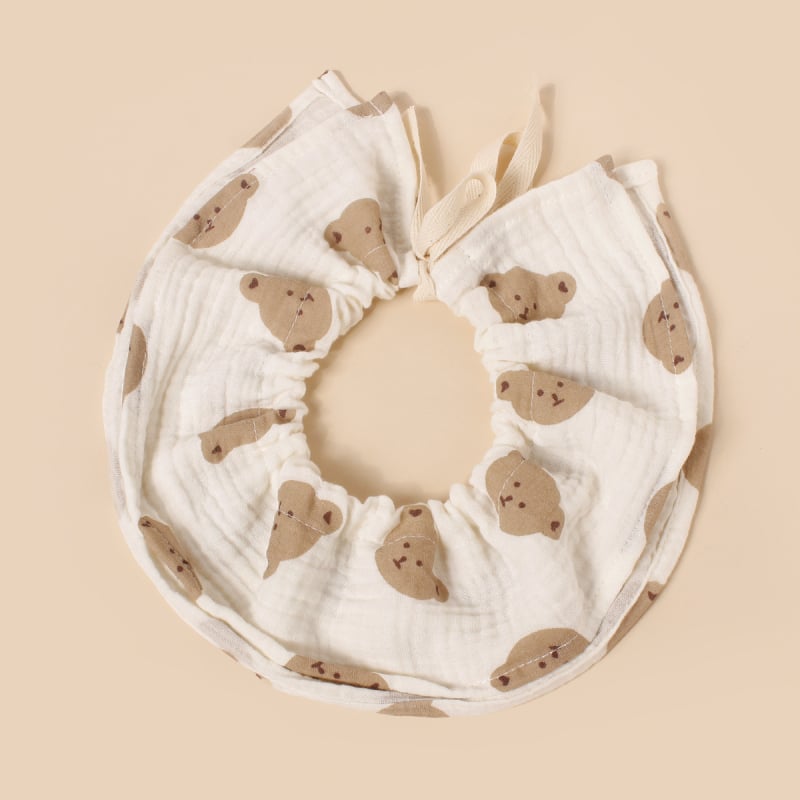 Baba pamutból készült etető ruházat? 360°-ban állítható övvel; négyréteg vast géz nyálkendő; kerek forma; nagy nedvszívó képesség; 0–3 éves csecsemők számára