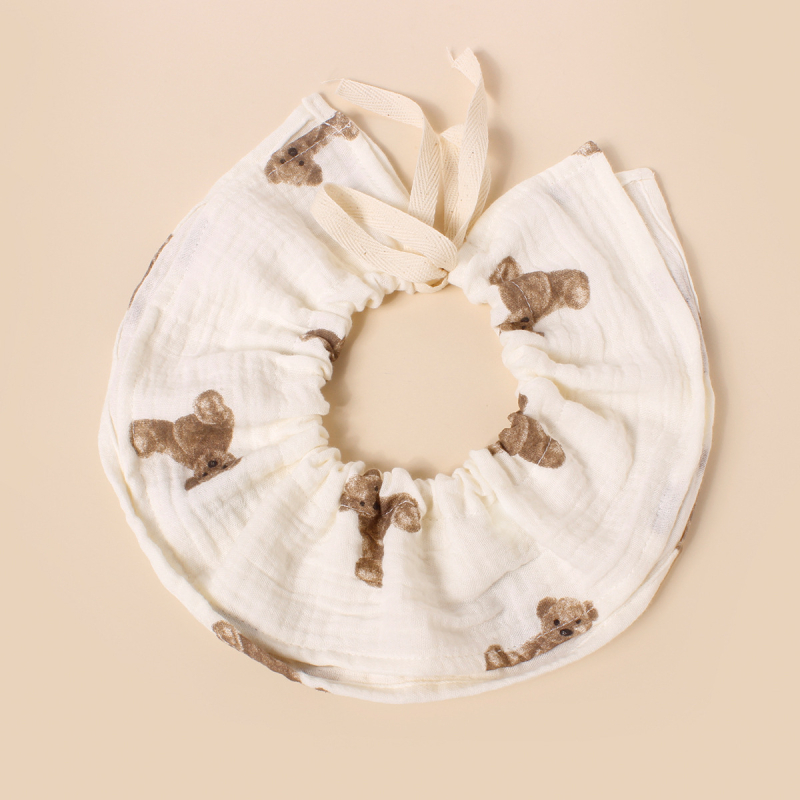 Baba pamutból készült etető ruházat? 360°-ban állítható övvel; négyréteg vast géz nyálkendő; kerek forma; nagy nedvszívó képesség; 0–3 éves csecsemők számára