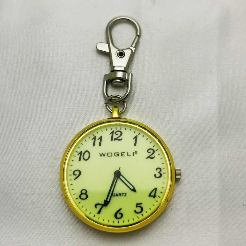 Õde kell võtmehoidjaga, kvartsliikumine (Wogeli), helendav, PC peegel, kvarts korpus