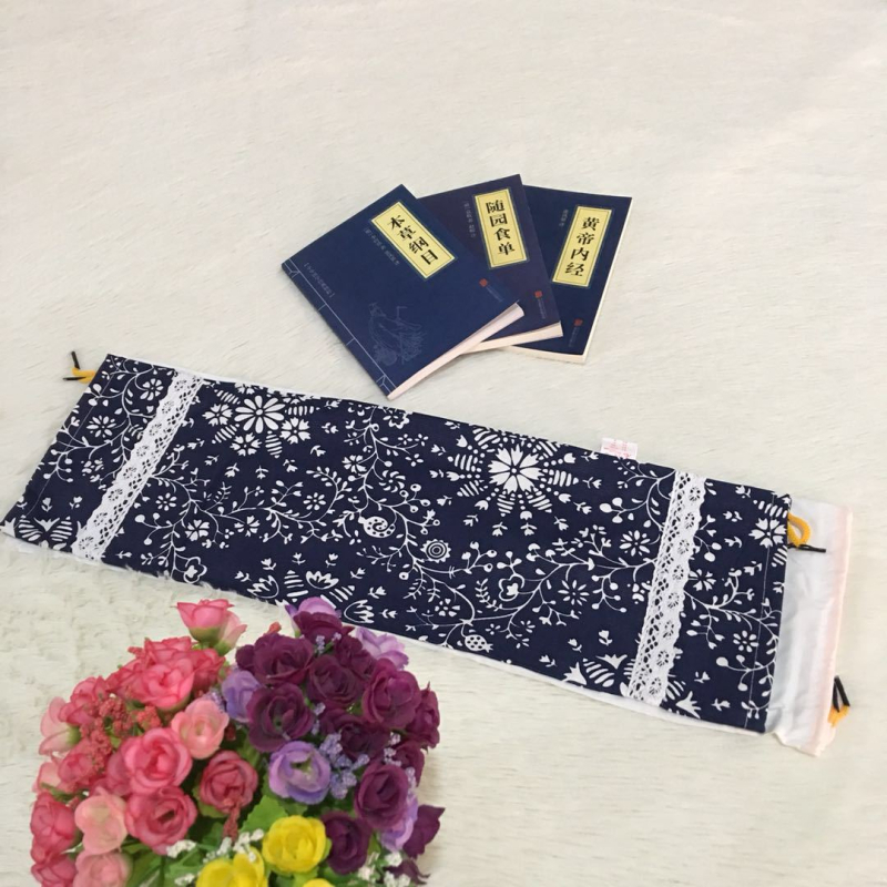 Cervikalni jastuk kružnog oblika, od staroga grubog platna, punjen heljdom, uključuje navlaku za jastuk i unutarnju navlaku