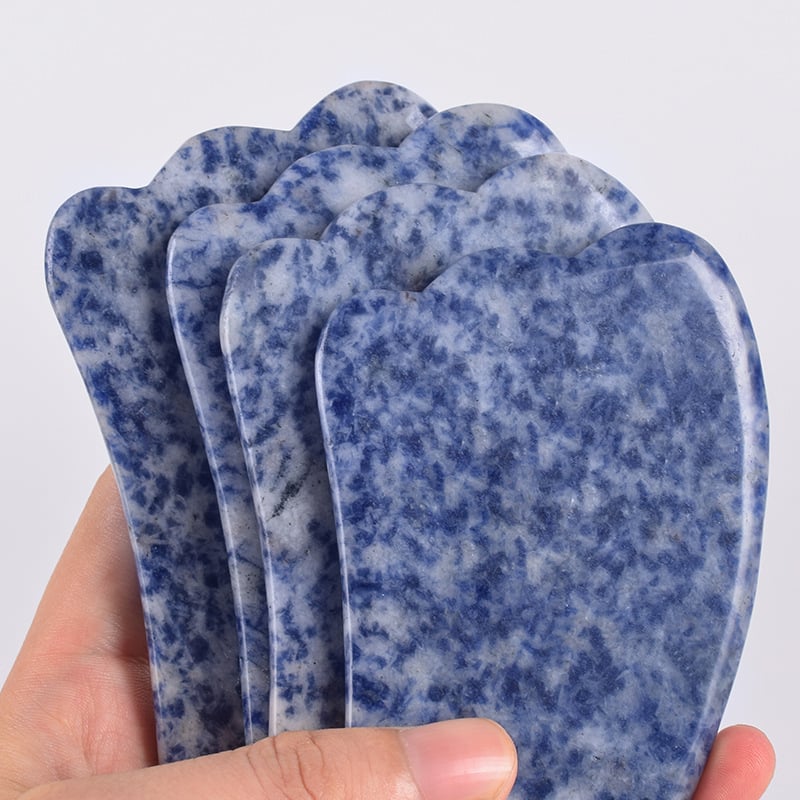 Gua Sha sejas instruments no dabīga kristāla – pulēta virsma, pielāgojama, ģeometriska forma