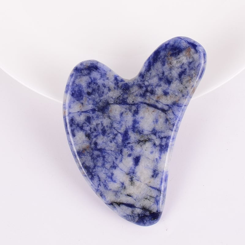 Gua Sha sejas instruments no dabīga kristāla – pulēta virsma, pielāgojama, ģeometriska forma