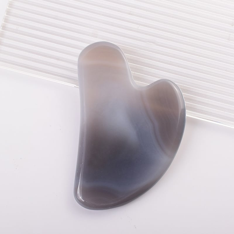 Gua Sha sejas instruments no dabīga kristāla – pulēta virsma, pielāgojama, ģeometriska forma