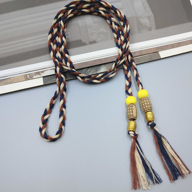 Medvilnės audinio dekoratyvinė liemens juosta, etninio stiliaus – suknelės aksesuaras (Medžiaga: Kita; Sezonas: Pavasaris; Stilius: Šiuolaikinis paprastumas; Panaudojimas: Laisvalaikio kelionės; Išleidimas: Žiema 2022)