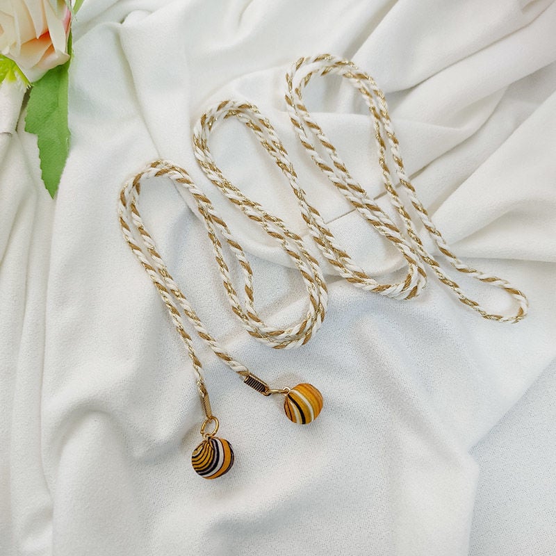 Medvilnės audinio dekoratyvinė liemens juosta, etninio stiliaus – suknelės aksesuaras (Medžiaga: Kita; Sezonas: Pavasaris; Stilius: Šiuolaikinis paprastumas; Panaudojimas: Laisvalaikio kelionės; Išleidimas: Žiema 2022)