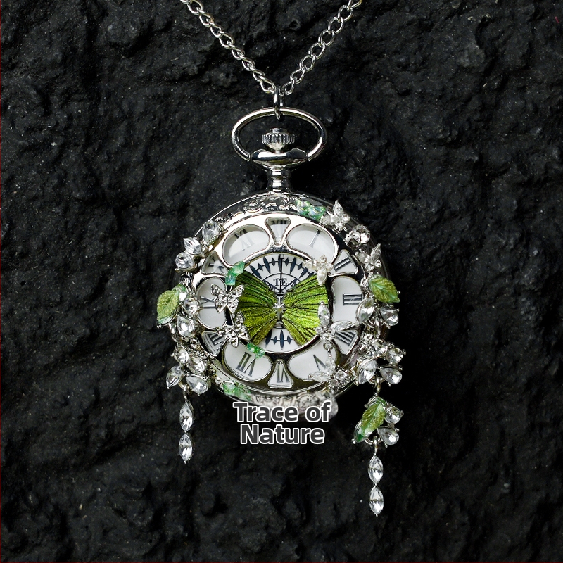 Liblika taskukell koos liikuva tegeliku liblika eksemplariga, ideaalne kingitus tüdrukutele ja sõbrannadele (Elektroniline mehhanism; veekindlus 35 m; silikoonkorpus; ümmargune kellapaneel; ABS klaas)