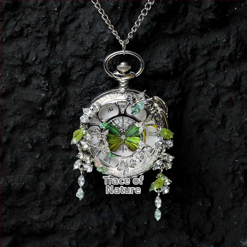 Liblika taskukell koos liikuva tegeliku liblika eksemplariga, ideaalne kingitus tüdrukutele ja sõbrannadele (Elektroniline mehhanism; veekindlus 35 m; silikoonkorpus; ümmargune kellapaneel; ABS klaas)