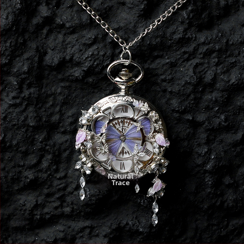 Liblika taskukell koos liikuva tegeliku liblika eksemplariga, ideaalne kingitus tüdrukutele ja sõbrannadele (Elektroniline mehhanism; veekindlus 35 m; silikoonkorpus; ümmargune kellapaneel; ABS klaas)