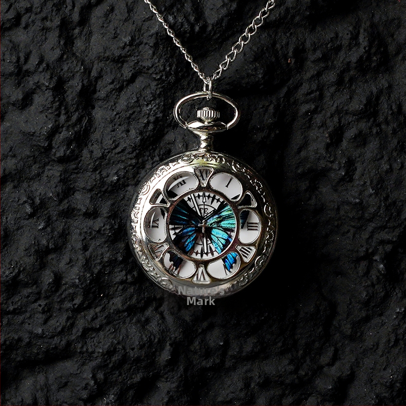 Liblika taskukell koos liikuva tegeliku liblika eksemplariga, ideaalne kingitus tüdrukutele ja sõbrannadele (Elektroniline mehhanism; veekindlus 35 m; silikoonkorpus; ümmargune kellapaneel; ABS klaas)