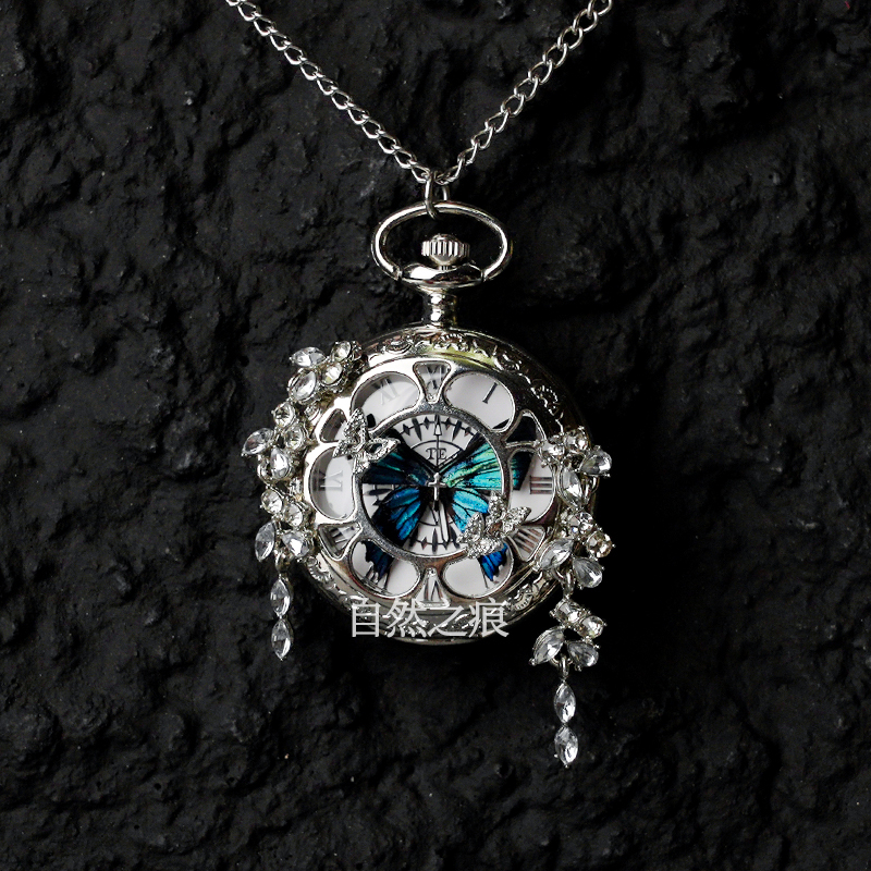 Liblika taskukell koos liikuva tegeliku liblika eksemplariga, ideaalne kingitus tüdrukutele ja sõbrannadele (Elektroniline mehhanism; veekindlus 35 m; silikoonkorpus; ümmargune kellapaneel; ABS klaas)