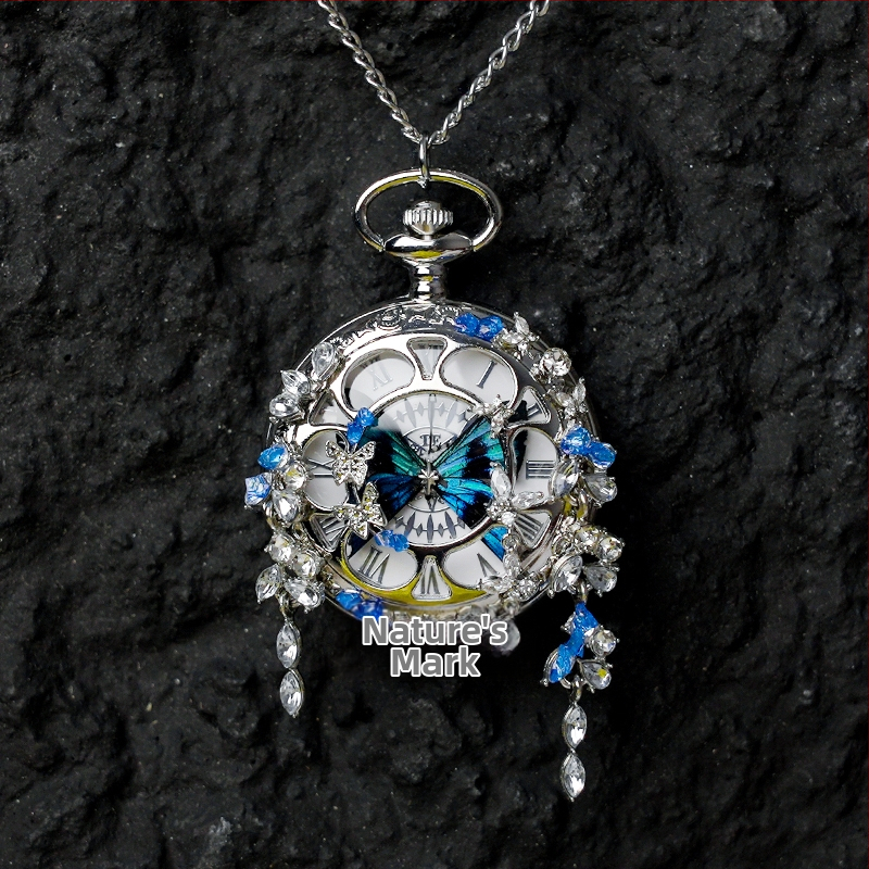 Liblika taskukell koos liikuva tegeliku liblika eksemplariga, ideaalne kingitus tüdrukutele ja sõbrannadele (Elektroniline mehhanism; veekindlus 35 m; silikoonkorpus; ümmargune kellapaneel; ABS klaas)