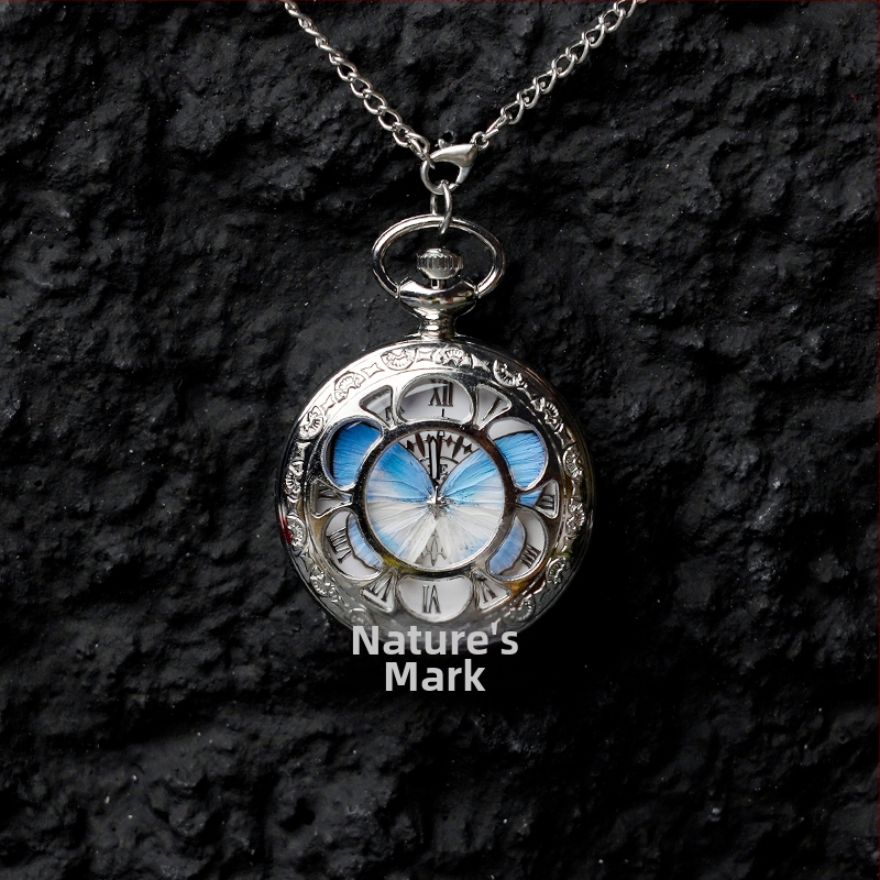 Liblika taskukell koos liikuva tegeliku liblika eksemplariga, ideaalne kingitus tüdrukutele ja sõbrannadele (Elektroniline mehhanism; veekindlus 35 m; silikoonkorpus; ümmargune kellapaneel; ABS klaas)