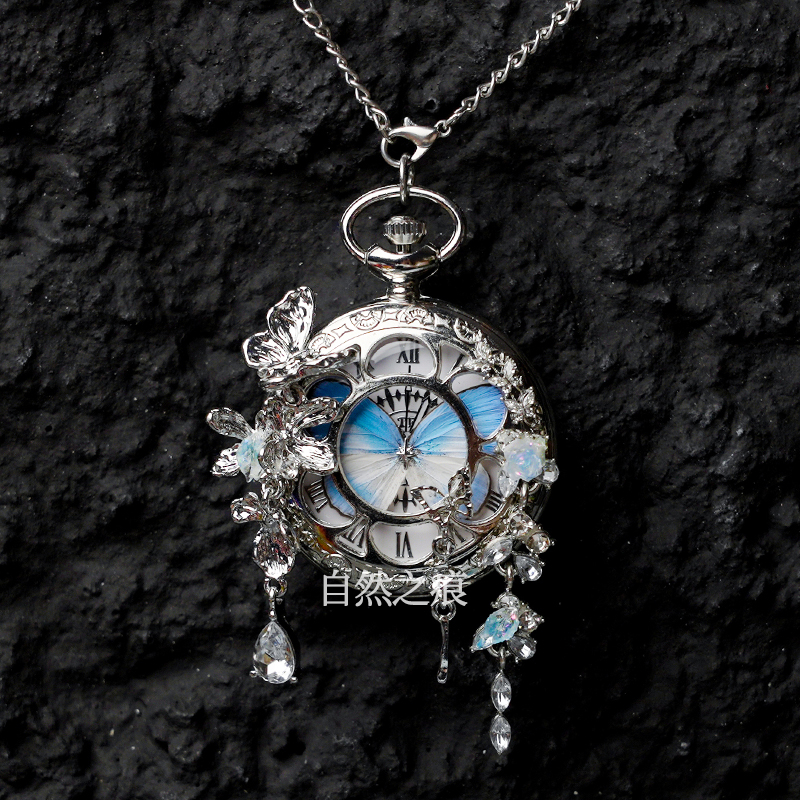 Liblika taskukell koos liikuva tegeliku liblika eksemplariga, ideaalne kingitus tüdrukutele ja sõbrannadele (Elektroniline mehhanism; veekindlus 35 m; silikoonkorpus; ümmargune kellapaneel; ABS klaas)