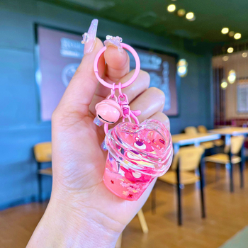 Akrüülne võtmehoidja, multikas stiil, karu motīvā ar maasikatega, quicksand efekts