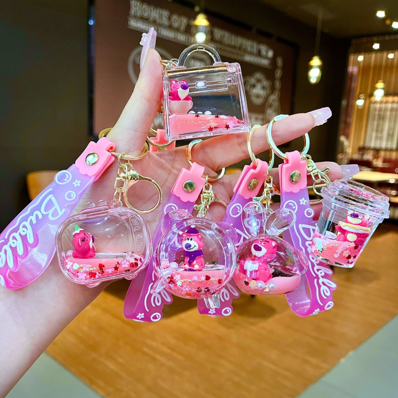 Akrüülne võtmehoidja, multikas stiil, karu motīvā ar maasikatega, quicksand efekts