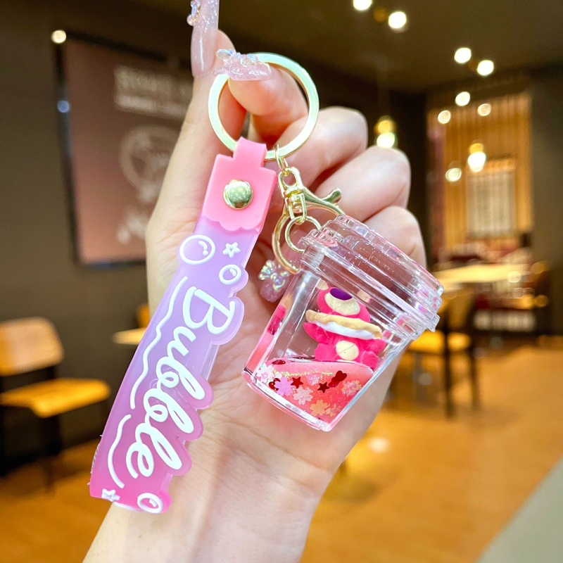 Akrüülne võtmehoidja, multikas stiil, karu motīvā ar maasikatega, quicksand efekts