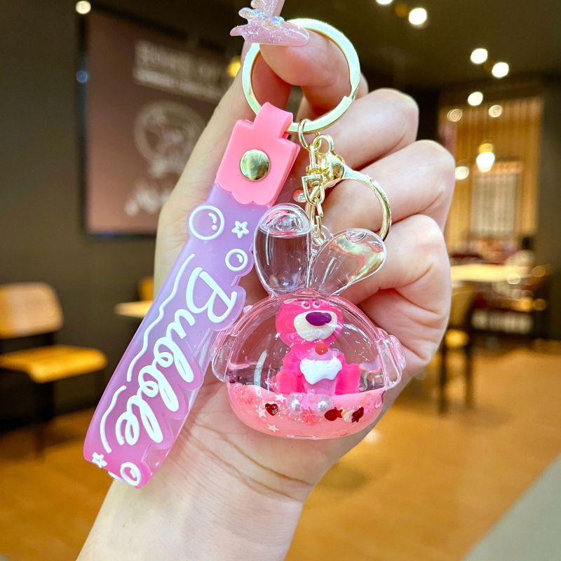 Akrüülne võtmehoidja, multikas stiil, karu motīvā ar maasikatega, quicksand efekts