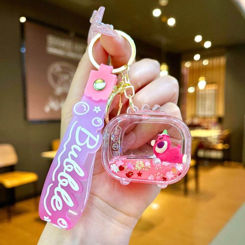 Akrüülne võtmehoidja, multikas stiil, karu motīvā ar maasikatega, quicksand efekts