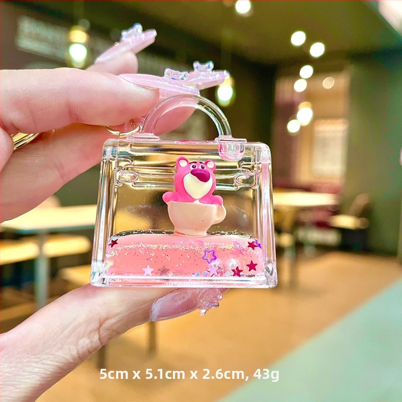 Akrüülne võtmehoidja, multikas stiil, karu motīvā ar maasikatega, quicksand efekts