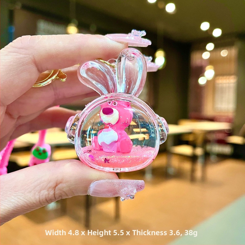 Akrüülne võtmehoidja, multikas stiil, karu motīvā ar maasikatega, quicksand efekts