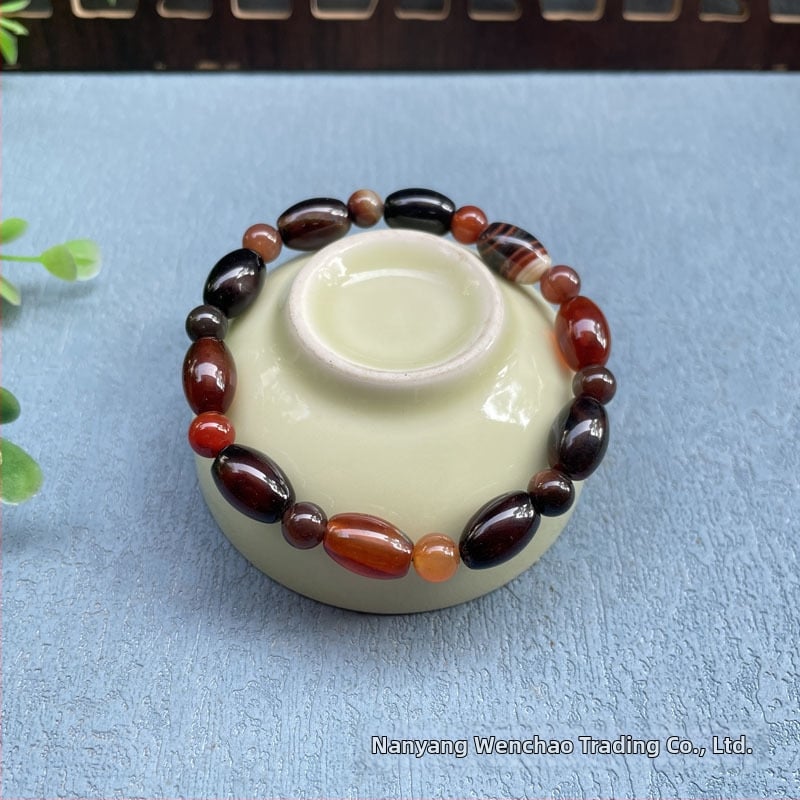 Akatā rokassprādze ar rižu pērļām, ģeometriska forma, dabisks materiāls, karājošās pērles