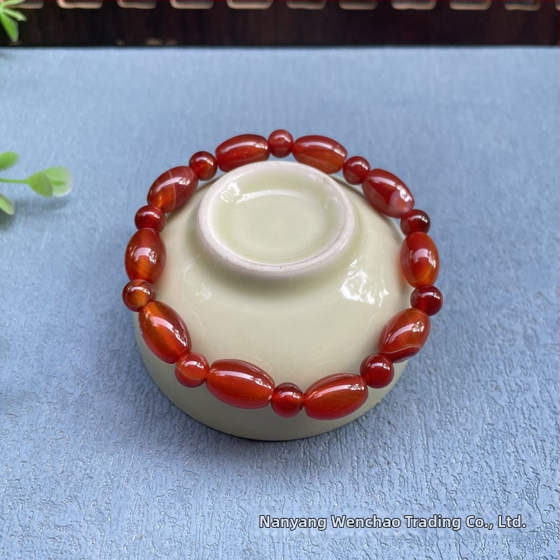 Akatā rokassprādze ar rižu pērļām, ģeometriska forma, dabisks materiāls, karājošās pērles