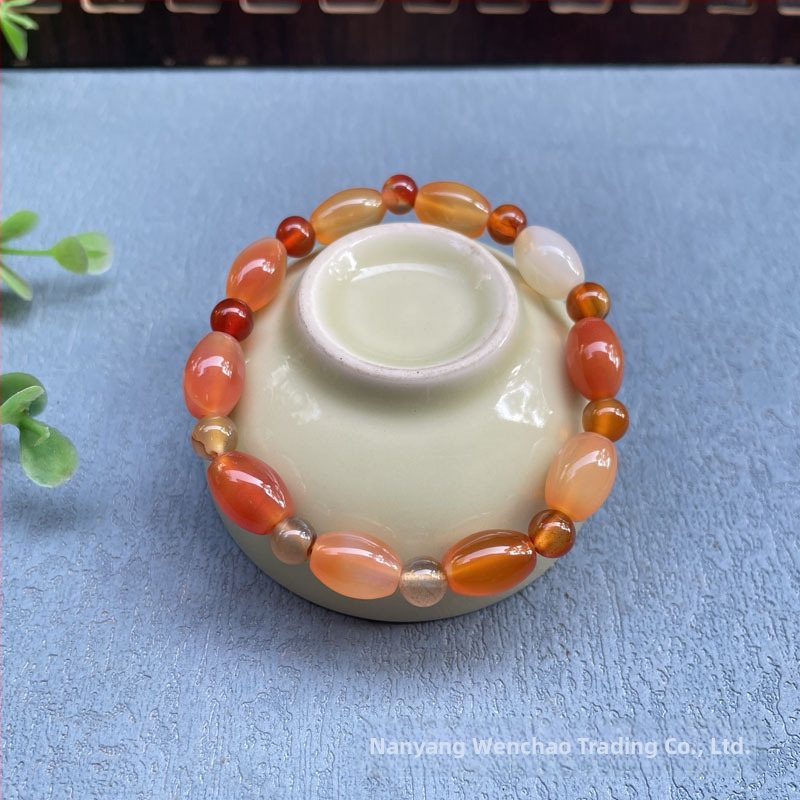 Akatā rokassprādze ar rižu pērļām, ģeometriska forma, dabisks materiāls, karājošās pērles