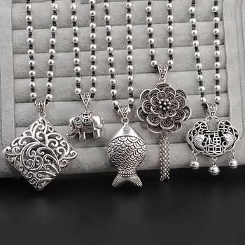 Lydinio puloverio grandinėlė, ilga karolė su kutiniu pakabuku, retro etno stilius