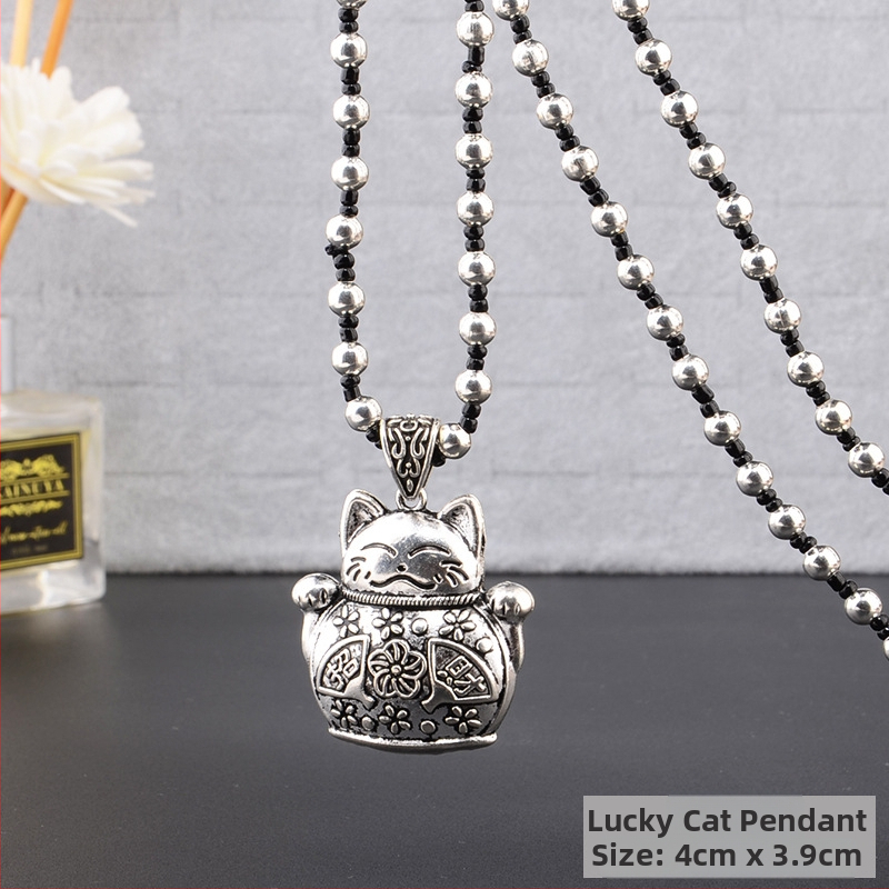 Lydinio puloverio grandinėlė, ilga karolė su kutiniu pakabuku, retro etno stilius