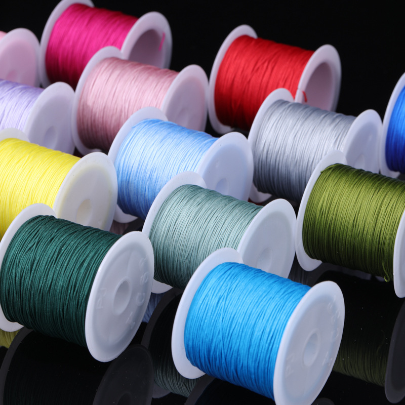 Rankų darbo karoliukų virvė pakabukui (poliesteris, Boring, 2021 ruduo)