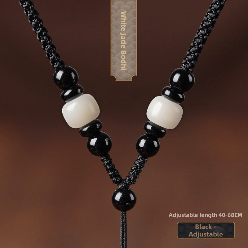 Hetianos nefrito pakabukas ant rankų pintos vėrinio, apdorotas nefritas