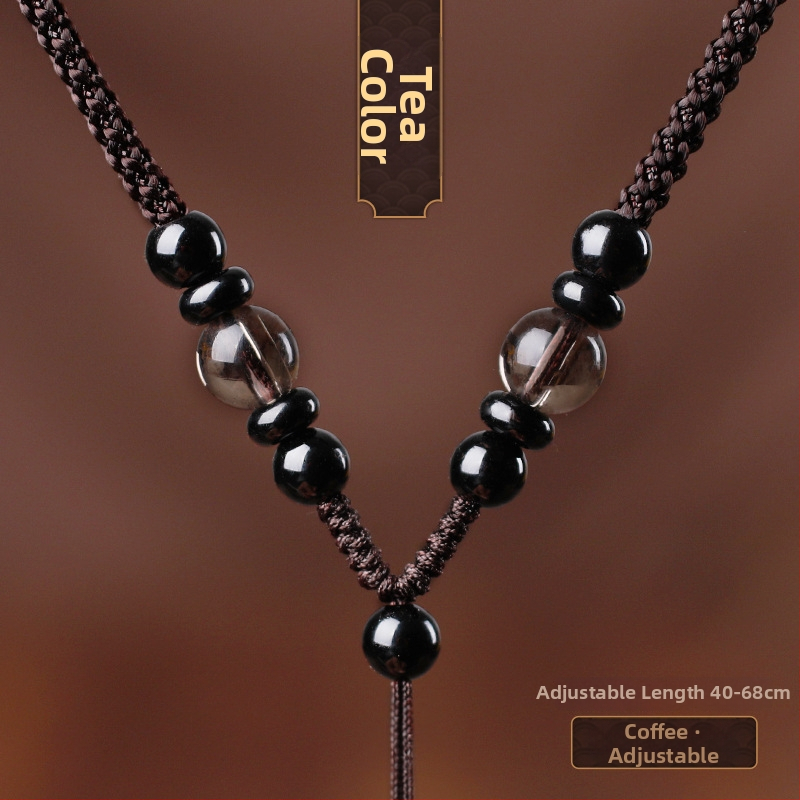 Hetianos nefrito pakabukas ant rankų pintos vėrinio, apdorotas nefritas