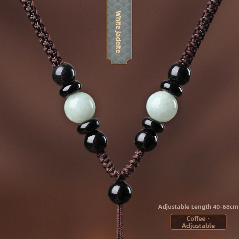 Hetianos nefrito pakabukas ant rankų pintos vėrinio, apdorotas nefritas