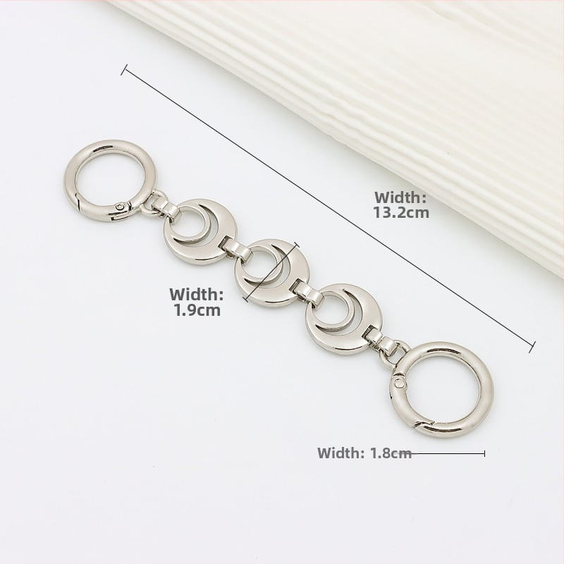 Koti õlarihm pikendatava ahelaga – metall, laiendus, tähtedega muster, kevad 2024