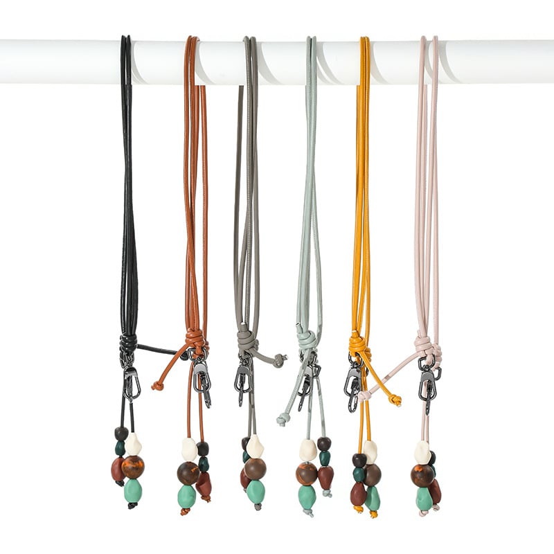 Evelyne stiilis käekoti rihm kašuu helmidega (Materjal: super kiududest valmistatud vaik; Aasta/sezon: kevad 2025; Funktsioonid: kaunistab, vähendab koormust, selja kaitse; Stiil: värske ja magus; Kategooria: käekoti/õlarihm)