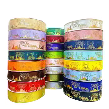 Dekoratyvinė juostelė su folijos įspaudu, motyvais: žvaigždė, mėnulis ir raidės; skirta dovanoms įvynioti ir šventinei dekoracijai